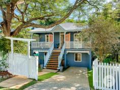  36 Willis St Tarragindi QLD 4121 A celebration of old-world elegance, this dual-level worker’s cottage with tasteful updates is set amongst verdant greenspace. Translating to ‘beautiful’ in the indigenous Yorta Yorta language, the aptly-named ‘Kalimna’ invites you to enjoy a truly fantastic lifestyle. Benefitting from having just one neighbour, the home was originally moved from Kangaroo Point to be positioned in a family-friendly enclave. The property includes: - Grand character façade complemented by ornate fretwork, a covered front verandah and picket-fenced front gardens - Traditional pine floors upstairs and engineered bamboo floors downstairs, as well as lofty ceilings, VJ walls, casement windows and ceiling roses throughout - Generous living area and an adjoining study nook upstairs - Connecting dining room, plus a tidy kitchen displaying a tiled splashback and ample cupboard storage - Large covered rear deck looking out to a lush canopy - Second living area or rumpus room downstairs; the ground level was renovated by Sovereign Homes - Covered rear terrace leading to a fully-fenced artificially-turfed rear yard showcasing mature gardens - Two sizeable bedrooms upstairs and a well-appointed full bathroom - Another two bedrooms downstairs fitted with built-in robes - Second full bathroom and a separate laundry boasting rear terrace access - Off-street parking for one car - Air-conditioning, ceiling fans, a solar power system, security screens and superb storage Only six kilometres from Brisbane’s CBD, this exceptional residence is close to a multitude of shops and dining options. Stones Corner’s attractions, the South East Busway and Greenslopes Private Hospital are also nearby. Falling within the Junction Park State School and Yeronga State High School catchment area, this brilliant home is also a short drive from Saint James Catholic Primary School, Our Lady of Mount Carmel Primary School and Loreto College. 