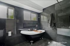  15 Lindeman Cl Eleebana NSW 2282 $950,000-$1,045,000 How many times have you wished for more entertaining space ... or that the kids had somewhere to play in bad weather? Have you been looking for a family home that offers ... MORE ... then look no further. Let's start with the location, because that too is a drawcard! This feature packed, single level brick home is located within 350 metres of Eleebana Childrens Centre, 1.5kms from Eleebana Public School and less than 3 kms from Warners Bay and Mount Hutton Shopping Centres - and is just a short drive from the shores of Lake Macquarie! The slightly sloped block is on the high side of prestigeous Lindeman Close, and has a parking pad tucked in the front corner, perfect for the boat or van ... or your teenagers car! For those catching the bus, the bus stop in Glad Gunson Drive is under 250 metres walk. Now, let's take you inside ... every inch of this floorplan is useful and every room is both modern and practical. The formal entry space even has a perfectly positioned closet - ideal for coats, umbrellas and for kicking off your shoes! The entry leads straight to the L-shaped formal living and dining space with the modern kitchen positioned right in the heart of the home. The kitchen will please the most avid chef with a dishwasher, natural gas cooktop and wall oven and overlooks the rear informal meals and living areas. Just beyond is a beautiful alfresco area with another covered versatile entertaining space, play room or man cave. Freshly painted throughout with new floating floors to the living areas, the formal living and dining area feature a split system reverse cycle air conditioner. There are two good-sized bedrooms at the front of the home, both have built-in wardrobes, the main features an ultra modern ensuite. The other two bedrooms are generous, both with built-in robes and are positioned near the stunning modern bathroom with floor-to-ceiling dark tiles and a modern claw foot bath. The attached double garage opens to the alfresco area, providing cover for anyone returning home .. and it's just a few steps from the kitchen, so you won't have to lug heavy groceries too far! 