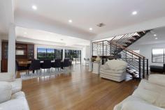  96 Kambora Avenue Davidson NSW 2085 $2,450,000 96 Kambora Avenue Davidson is proudly presented by Nima Aliasgary and Irina Bolshakova of Ray White Fairweather Group. Step inside this modern open-plan masterpiece nestled in a quiet family-friendly area, overlooking Garigal National Park. This spacious architecturally designed home built in 2001 is on a well laid out block and offers the perfect blend of family living and entertaining. The flexible multi-storey layout showcases high ceilings from the top level, creating a light-filled interior that compliments the spacious living zones as you enter. The free flowing design looks directly out to an oversized balcony and undercover terrace with a leafy backdrop, perched above a majestic in-ground concrete swimming pool. Featuring a recently renovated kitchen and bathrooms, this expansive home boasts 6 bedrooms and 3 full bathrooms, plus a double lockup garage. A separate downstairs area is perfect for a teenage retreat or offers potential dual living arrangements. This home is located footsteps away from local primary and secondary schools, direct city bus services, Glenrose Shopping Village and is only a 15 minute drive to beautiful beaches. Open plan living areas on the ground floor, opening to entertaining terrace with tree-top views Fully renovated gas kitchen with European appliances, island bench and butler's pantry 4 oversized bedrooms on the first floor, Master with en-suite and views Additional study/home office, renovated family bathroom with bath and shower 2 more bedrooms on the lower level, one with en-suite and walk-in robe, rumpus room, powder room Large solar-heated saltwater swimming pool, refurbished 2 years ago Double lock-up garage, ducted air-conditioning Close distance to Kambora Public, St Martin's Primary, Covenant Christian, Kamaroi Rudolf Steiner, John Colet and other popular local schools. 