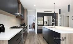  8 Harnett Ln Mittagong NSW 2575 $2,450,000 - $2,495,000 Positioned in Mittagong's exclusive blue-ribbon pocket, Mount Gibraltar. Boasting a whisper quiet setting on just over an acre of lush mountain surrounds, this magnificent residence redefines the meaning of a family sanctuary. Spanning two incredibly spacious levels, striking contemporary interiors are flawless in both their presentation and functionality, providing everything modern families require with ease. Though tempting to simply hide away from the world here, the home’s capacity for entertaining is fabulous and with a setting as idyllic as this one, sharing it with those you love will create many wonderful memories to treasure. 14kw ducted heating and cooling system ⎜Wood fireplace ⎜Ceiling fans Formal lounge ⎜Formal dining ⎜Living room ⎜Home theatre Home office ⎜Upstairs sitting area Bespoke European made kitchen with island bench ⎜Breakfast room 900mm Smeg gas cooktop ⎜Dual Smeg wall ovens ⎜ Smeg undermount sink Caesarstone bench tops and splashback ⎜Hybrid laminate floors Woollen carpet ⎜Built-in wardrobes in four bedrooms Master retreat with walk-in robe, ensuite and views Twin vanities in bathrooms ⎜Rain-shower heads ⎜Electric heated towel rails Spa bath in ensuite ⎜Guest powder room Expansive composite wraparound entertaining terrace Double electric garage ⎜Driveway parking Extensive storage ⎜Large laundry Wired for connectivity throughout 