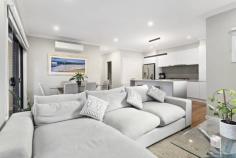  21 Dublin Rd Ringwood East VIC 3135 $870,000 - $950,000 The perfect presentation for an easy lifestyle, and the perfect position being a few short minutes to Eastland and Ringwood East shops and the train stations, and to Ringwood Secondary College and Great Ryrie Primary School. Aquinas College and Aquanation pool and gym are also close by. A modern townhouse offering street frontage, a comfortable and current open plan living design on the ground floor, a second living room upstairs, three bedrooms with mirrored built in robes, two bathrooms and a powder room. Live and entertain in style with a kitchen that is easy on the eye and extremely well appointed with a stone waterfall island bench top and Westinghouse stainless steel appliances, with the addition of an outdoor deck and a landscaped backyard which offers a water tank and access into the garage. Further highlights include ducted heating, x2 split system AC's, hardwood floors and modern window furnishings. 