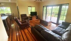  15 North Hull Road Carmoo QLD 4852 $439,000 This very attractive rural property is only an 8 minute drive (approx.) from the Mission Beach coast with 12 lush tropical islands minutes offshore, including Dunk and Bedarra Islands in Great Barrier Reef Marine Park Waters. Cairns is 2 hours away with domestic and international airport. The home is elevated and has commanding, peaceful views out over rolling lawns, rainforests and distant mountain ranges. The Mission Beach region is famous for its World Heritage Rainforest and Marine Parks and is a boating and fishing paradise. There is a boat ramp minutes away in the Hull River National Park and Clump Point Boating Harbour is at nearby Mission Beach and is a state of the art marine facility. Some features include: beautiful timber construction with polished timber floors large rural allotment of 8001m2 (2 acres) with rural residential zoning open plan lounge /living /kitchen spacious wide verandas on two sides to capture cooling breezes lounge/ living areas open directly on to the wide verandas solid timber kitchen; walk in pantry and island bench main bedroom has access directly to veranda and bathroom built-in robes; main bedroom has walk in robe split air conditioning plunge bath with spa; separate laundry internal timber doors and beautiful French doors solar panels; solar hot water system with booster 5000 L rainwater tank; town water and mains power hardwood timber framed home with Primeline cladding Colourbond 8 m x 7 m double carport plus 8 m x 7 m double lock-up roller door shed section; total 16 m x 7 m under roof garaging 6 m x 7 m freestanding 3 door Colourbond shed at entrance to the property plenty of room for caravan and boat property is partly fenced quiet rural neighbourhood 