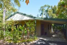  7 Hutchison Close Mission Beach QLD 4852 $389,000 This large four bedroom home is tucked away on a leafy 978m2 lot which backs onto a rainforest reserve. The home is at the end of a quiet cul-de-sac just minutes from the community aquatic centre, sporting oval and art gallery. The 14 km long beach at Mission Beach is about 1 km away. The nearby Mission Beach tourist village with restaurants cafes and shops is also nearby (1.5km). HIGHLIGHTS INCLUDE: Cool, long patios around three sides Leafy setting with lots of shade Solid cement block construction with rendered cement walls internally throughout Main bedroom has ensuite with large shower, vanity and WC Kitchen and bathroom are modern Bay window is an attractive feature in the living room Large split air-conditioner 3 m x 3 m garden shed So much outdoor undercover area for those rainy days Security screens Home adjoins Rainforest Reserve along rear boundary Mission Park Estate is a quiet leafy enclave with only residential traffic movements Realistic affordable price 