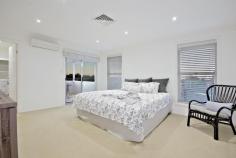  23 Eleanor Avenue Belmore NSW 2192 This flawless two-storey grand family residence is the ultimate statement in modern living. Perfectly located in a quiet, tree-lined cul-de-sac with easy access to transport and shops, it offers a contemporary family haven with an inviting poolside entertaining deck and elevated city views from the second level. Distinguished by spacious proportions, bright interiors and a tasteful neutral colour palette, this superb residence delivers a luxurious family oasis, all on an extra wide frontage of 16.76m. – Six (6) substantial bedrooms with built-in robes and 3 with private balconies – Extra-large master with en-suite, walk-in wardrobe & delightful city views from private balcony – Additional studio room with en-suite, currently utilised as poolside gymnasium – Modern kitchen with stainless steel appliances, dishwasher & ample bench space – Sunlit open living and dining areas with seamless indoor/outdoor flow – Undercover alfresco entertaining deck overlooking in-ground swimming pool & manicured lawns – 4 spacious, fully-tiled bathrooms with two bath tubs and separate showers – Remote lock up garage with internal access, storage plus additional front car spot – 5 mins to Belmore village shops, train station, parks and local schools – Footsteps to All Saints Grammar, Clemton Park Coles and Belmore IGA Additional Features: Electronic security gates, laundry room, storage room, linen cupboards, security system with intercom, multiple air-conditioning units, shutter blinds, reverse cycle ducted air-conditioning, timber floorboards, carpet and tiles. 