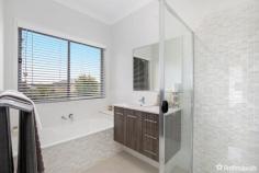  1 McArthur Close Armidale NSW 2350 $700,000 to $770,000 Presenting the masterfully designed Cosmopolitan. Located within the Foothills Estate, this stunning home boasts a plethora of living spaces and four generously sized bedrooms. At nearly 300 sq m, the scale of this home is apparent the moment you walk in the front door. The spacious open plan living area includes a gourmet kitchen with walk-in larder, family room, dining area and a TV snug, plus a separate games room and a children’s activity room. The master suite provides the ultimate luxury accommodation with a walk-in-robe, expansive ensuite, and a private courtyard oasis. If you are looking for a home that’s focus is on family living and entertaining, then this is a true dream home that will inspire you. This home is a walk in, walk out with all furniture included. 