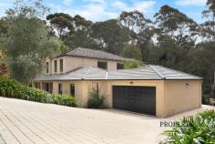  8 Harnett Ln Mittagong NSW 2575 $2,450,000 - $2,495,000 Positioned in Mittagong's exclusive blue-ribbon pocket, Mount Gibraltar. Boasting a whisper quiet setting on just over an acre of lush mountain surrounds, this magnificent residence redefines the meaning of a family sanctuary. Spanning two incredibly spacious levels, striking contemporary interiors are flawless in both their presentation and functionality, providing everything modern families require with ease. Though tempting to simply hide away from the world here, the home’s capacity for entertaining is fabulous and with a setting as idyllic as this one, sharing it with those you love will create many wonderful memories to treasure. 14kw ducted heating and cooling system ⎜Wood fireplace ⎜Ceiling fans Formal lounge ⎜Formal dining ⎜Living room ⎜Home theatre Home office ⎜Upstairs sitting area Bespoke European made kitchen with island bench ⎜Breakfast room 900mm Smeg gas cooktop ⎜Dual Smeg wall ovens ⎜ Smeg undermount sink Caesarstone bench tops and splashback ⎜Hybrid laminate floors Woollen carpet ⎜Built-in wardrobes in four bedrooms Master retreat with walk-in robe, ensuite and views Twin vanities in bathrooms ⎜Rain-shower heads ⎜Electric heated towel rails Spa bath in ensuite ⎜Guest powder room Expansive composite wraparound entertaining terrace Double electric garage ⎜Driveway parking Extensive storage ⎜Large laundry Wired for connectivity throughout 