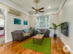  36 Willis St Tarragindi QLD 4121 A celebration of old-world elegance, this dual-level worker’s cottage with tasteful updates is set amongst verdant greenspace. Translating to ‘beautiful’ in the indigenous Yorta Yorta language, the aptly-named ‘Kalimna’ invites you to enjoy a truly fantastic lifestyle. Benefitting from having just one neighbour, the home was originally moved from Kangaroo Point to be positioned in a family-friendly enclave. The property includes: - Grand character façade complemented by ornate fretwork, a covered front verandah and picket-fenced front gardens - Traditional pine floors upstairs and engineered bamboo floors downstairs, as well as lofty ceilings, VJ walls, casement windows and ceiling roses throughout - Generous living area and an adjoining study nook upstairs - Connecting dining room, plus a tidy kitchen displaying a tiled splashback and ample cupboard storage - Large covered rear deck looking out to a lush canopy - Second living area or rumpus room downstairs; the ground level was renovated by Sovereign Homes - Covered rear terrace leading to a fully-fenced artificially-turfed rear yard showcasing mature gardens - Two sizeable bedrooms upstairs and a well-appointed full bathroom - Another two bedrooms downstairs fitted with built-in robes - Second full bathroom and a separate laundry boasting rear terrace access - Off-street parking for one car - Air-conditioning, ceiling fans, a solar power system, security screens and superb storage Only six kilometres from Brisbane’s CBD, this exceptional residence is close to a multitude of shops and dining options. Stones Corner’s attractions, the South East Busway and Greenslopes Private Hospital are also nearby. Falling within the Junction Park State School and Yeronga State High School catchment area, this brilliant home is also a short drive from Saint James Catholic Primary School, Our Lady of Mount Carmel Primary School and Loreto College. 