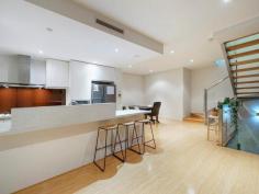  4/111-113 Summers St Perth WA 6000 Architecturally designed to encompass the gorgeous natural light, this contemporary 4 bedroom, 2 bathroom, 3 W/C tri level townhouse is set behind a secure electronic gate and complete with double lock up garage. Ideal for those wanting a lock up & leave lifestyle without having to compromise on space nor style! Situated in a well-maintained group of 6 boutique townhouses, behind a secure electronic gate, and with little to no maintenance required. This home is sure to impress home owners, downsizers, professional couples, and investors alike! Spanning 3 levels, with each floor connected by the architectural floating steel and timber staircase, the entry foyer leads into a generously proportioned flex space with bi-fold doors leading out to the ground floor courtyard. Whether you configure it as a fourth bedroom, second living zone or ground floor home office where you can service clients without having to disturb the family, the flexibility of this space is a massive drawcard! Also housed on the ground floor is a well-equipped laundry with W/C and double garage with storeroom and internal access. Up the feature floating staircase to the first floor, you are instantly greeted by the solid bamboo timber flooring that adorns this middle level. Bright and airy, the spacious open plan kitchen, living and dining area with north-facing balcony access certainly won't disappoint! Complete with Caesarstone benchtops, stainless steel appliances including gas cooktop, double fridge recess and ample cabinetry, the chef's kitchen seamlessly connects with the living areas to ensure no one misses out on the conversation! Situated in their own wing, the second and third bedrooms (both with BIR's) are serviced by the main bathroom featuring separate bath and shower plus floor to ceiling tiling. Enjoying pride of space on the upper floor, the spacious master suite is the ideal haven after a hard day's work! Boasting walk in robe, well-appointed ensuite and large terrace balcony with city glimpses, it certainly won't disappoint. Location wise, the East Perth train station and free CAT bus into Perth CBD is a short stroll away, the iconic Beaufort Street cafe strip minutes' walk away, plus Northbridge, the CBD and Swan River all within easy reach, this is inner city living at its very best. 