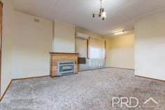  38 Sunnyside Ave Batlow NSW 2730 $292,000 Positioned on the high side of Sunnyside Avenue and with sweeping views of the picturesque surrounds, you will love the simplicity and potential this three-bedroom home with open plan living and dining has to offer. Do not miss your opportunity, call today to book your inspection. Premiere Features: - Three great size bedrooms - Large bathroom with combined shower over bath, single vanity and toilet - Formal kitchen area positioned to the rear of the plan and overlooking the rear yard, electric cooktop and ample bench space and storage - Open Plan dining off kitchen and living - Large living area positioned to capitalise on the elevated position with split system air conditioning, gas heating and direct access to the front deck - Fully covered front deck overlooking the picturesque hillsides of Batlow - Single lock up garage - External laundry to the rear positioned under the roof line - Great size rear yard - 683m2 elevated allotment 