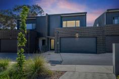  8/45 Negus Crescent Watson ACT 2602 $855,000 Impeccably presented in as-new condition, this three-bedroom townhouse delivers an opportunity to secure a quality home in one of Canberra's most convenient positions. Featuring an abundance of attributes that will tick off your home-buying shopping list, boasting open-plan living, neutral tones, brilliant natural light, a well-appointed kitchen, high ceilings, spacious bedrooms, and a stunning ensuite & main bathroom just to name a few. Located in the highly regarded and tightly-held "The Ridge" complex, and an easy commute to the Canberra CBD, this townhouse is the complete package for anyone looking for a modern home or turn-key investment property. Total internal size approx. 156.3sqm (including garage but excluding void & stairs) Open plan living areas with high ceilings Three bedrooms, each with built-in robes Bedroom three includes Murphy bed Kitchen featuring stone benchtops, Smeg appliances, gas cooktop Powder room on ground floor Double glazed windows 7.7kw solar panels on roof Ducted & zoned reverse-cycle air conditioning Automatic roller blinds to the living area Double garage with automatic door Private courtyard Original developers inclusion list available on request 