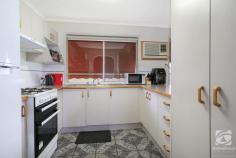  6/14 Graetz Court Lavington NSW 2641 $329,000 This solid three-bedroom brick unit is ideal for owner-occupiers or as an investment. Positioned at the front a 276m2 block, this unit provides a generous backyard for gardening, pets and children. One of eight free-standing units on a 3,288m2 block in total, this unit backs onto open parkland. With no rear neighbours and easy access via a gate, walking the dog or going for a stroll has never been easier. There is a large lounge room and dining just off the kitchen. A free-standing gas stove and a generous fridge space make it a very comfortable kitchen. This functional space conveniently overlooks the backyard. Two of the three bedrooms have built-in robes, while the third would make a great home office or perfect child's room. A reverse cycle cooler and gas wall heater provide comfortable temperature control year-round. A separate toilet compliments the large, combined laundry and bathroom. With a new shower and tiling plus a bath and independent vanity, this bathroom is great for a family. The porch in the front yard is the perfect spot to sit and read or watch the kids play. The single-car lockup garage has internal access to the unit, keeping you safe and dry while unloading the groceries. This unit is currently rented on a month-to-month basis. The updated rental appraisal is around $300 per week. The neighbourhood scheme is self-managed, by the owners at $155 per quarter for the grounds, maintenance and public liability insurance. 