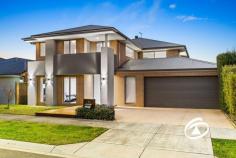  3 Graziers Cres Clyde North VIC 3978 $1,250,000 - $1,300,000 An exceptional Porter Davis build with an offering of uncompromising space, style and quality, this beautifully appointed 5-bedroom residence has been expertly crafted to cater to all stages of family living boasting 42sq URL on a 448m2 Lot. A model of modern sophistication with an emphasis on family functionality, the home offers the choice of 2 main bedrooms upstairs and downstairs. Featuring living areas on both levels – including a ground floor entertaining zone, a dedicated media room plus an enviable rumpus overlooking an enclosed alfresco setting complete with outdoor built-in seating and wall mounted bar counter. At the heart of the home, the stunning kitchen is anchored by an exquisite waterfall edge island and showcasing premium appliances along with a full butler’s pantry, laundry with drying racks, and plenty of storage. Additionally, three beautifully appointed bathrooms, a guest powder room and linen press complete the extras. Upstairs features the second master bedroom with an en-suite, WIR, private balcony and a kids retreat with an adjoining study all completed with a desk and returns. The remaining three bedrooms are serviced by a family bathroom & separate toilet. With a host of inclusions, only a visit will uncover, zoned heating/cooling, ducted vacuum, engineered floors, square set cornices, alarm system and a large (7.5 x 6.1) double garage with internal access. Low maintenance & with an abundance of space, the home is just moments to quality schools and major amenities. 