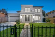  101 Shannon Street Box Hill North VIC 3129 With a grand façade, this well-kept four-bedroom family home is light-filled, bright and features high ceilings, this home is welcoming from the start. Behind a secure front fence and vehicle access gate, there's a long driveway for off-street vehicle parking large enough for a recreational vehicle or multiple cars. A double car garage provides secure, off-street parking. Inside, separate living areas upstairs and down provide ample space for everyone to truly enjoy the home. A modern kitchen features an island-style stone benchtop, a 900 mm gas cooktop and dishwasher for easy cleanup. Ample bench and butler's pantry provide storage for all your kitchen essentials. A downstairs master suite is perfect for multigenerational living or a guest room as it includes a walk-through robe as well as a private ensuite with double vanity, separate WC and bathtub. An additional separate powder room is also located downstairs. Ideal for the family that loves to entertain, enjoy two undercover areas with L-shaped decking for hosting family gatherings as well as a large yard for children and pets to play. The super-sized upstairs master bedroom features access to a private, decked balcony as well as a private ensuite with double vanity, luxury spa bath and walk-in robe. The remaining bedrooms are carpeted for comfort and all feature walk-in robes and private ensuites. Enjoy the added benefits of ducted heating, air conditioning, a large dedicated laundry area with walk-in linen storage, halogen downlighting and decorative pendant lighting as well as a security system with cameras for added peace of mind. Just a short drive to Westfield Doncaster and you'll be surrounded by desired local schools such as Koonung and Box Hill Senior Secondary Colleges and Box Hill North Primary School. Walking distance to Box Hill Hospital and Centro, local sporting and garden reserves such as Mont Albert and Hagenauer is just a short stroll away. 