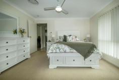  16 Earlsfield Street Biloela QLD 4715 $410,000 If you've been searching for just the right property with a list of features on your "check list", then search no further. Firstly, the appeal of a quiet cul de sac location, surrounded by other quality-built homes is bound to impress. This low set, brick home is ideal for family living. The open plan living and dining is spacious and filled light and the kitchen, finished in modern and practical colours, features a large pantry, dishwasher and electric cooktop and oven. If you have an overly large refrigerator, then this kitchen will accommodate it perfectly. The separate lounge room offers a quiet, comfortable retreat away from the main living area. The entire home is serviced by fully ducted air-conditioning for year-round enjoyment. There are five bedrooms, the sizeable master with walk in robe and ensuite. A double lock up garage with internal home access into the kitchen. The fully fenced 914sqm* allotment has a fully fenced back yard with 6ft privacy fencing. 