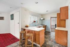  6 Coora Court Frankston VIC 3199 $620,000 - $682,000 Take the first step onto the property ladder or kickstart your renovation aspirations with this well-situated classic 1970s home tucked at the end of a tiny court in paces to McClelland College, Ballam Park Primary School and spectacular Ballam Park. Beyond the flamboyant decor of the era, a creative eye will instantly spot the potential for a stylish modern refurbishment of this family-friendly layout, which boasts two large living areas and a dining zone. Fitted with timber-veneer cabinetry and slate-look vinyl flooring, the kitchen enjoys a free-flowing layout spilling out to the family room and dining zone and is perfectly functional with a dishwasher, oven and gas cooktop as it awaits an eventual update. The three bedrooms cradled down the hallway share a full family bathroom with shower, bathtub and separate toilet, while a semi-enclosed covered patio area is waiting to be transform into an alfresco oasis. Just 900 metres to Karingal Village Shopping Centre, 650 metres to Ballam Park and 1.3 kilometres to the major shopping, restaurants and cinemas of Karingal Hub, the home also features ducted heating throughout, under house storage, a double garage and sits on a 613m2 (approx) allotment with potential for subdivision or redevelopment (STCA). 