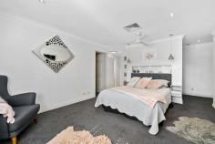  20B Westland Pl Waterford WA 6152 $1,100,000 Peacefully positioned at the end of a quiet cul-de-sac, this beautifully presented home is a real surprise package. With a flexible floor plan offering a range of living options, and with large living spaces, big bedrooms and beautiful outdoor areas, there is plenty of room for the whole family. Set on a prime 547sqm lot with delightful outdoor spaces, with a lovely park next door, and just a short stroll to the river, this is the perfect place to create a lifetime of family memories. • Beautiful big kitchen with quality appliances, stone tops, breakfast bar, and bar area • Big family dining area, flowing through bifold doors to outdoor entertaining • Spacious master suite with dual walk-in robes, superb ensuite with separate WC • Children’s bedroom wing, with three queen-sized bedrooms (all with robes) and family bathroom, separate powder room • Home theatre with built in cabinetry, including audio visual equipment • Huge family room with dual access from bedroom wing and kitchen • Central activity area, perfect for a home office or media room • Delightful outdoor spaces, with undercover entertaining, spa • Reticulated and landscaped garden setting, limestone paving • An array of fruit trees, including lemon, orange, mandarin, blackberry and mulberry • Plenty of internal and external storage, with two store sheds • Double garage with internal entry, plus attic storage with pull-down stairs • Excellent security with video surveillance, alarm • Ducted reverse cycle air conditioning, ducted vacuum • 5.5kw solar panel system, 300 litre solar hot water • Side walkway to children’s park, easy stroll to the river • Walking distance to Waterford Plaza, Curtin University, Canning College • Easy access to public transport and close to excellent schools 