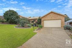  50 Banksia Street West Albury NSW 2640 $769,000 This lovely home has so much to offer. On a big block of 1227m2, with an additional two-car garage/workshop in the back yard, there is room for the whole family. Beautifully landscaped and cared for, there is ample room for entertaining adults and children alike in the spacious backyard. Plenty of room to run and separate garden areas provide interest and fun for all. From its lofty vantage point, the fully renovated kitchen with stone benchtops overlooks the town below. Wood flooring in all the living areas provides character and charm that will not go unnoticed by guests. The split-level design adds interest and separation between the living zones, so parents and children can have quiet enjoyment of their chosen pastimes. Having the large master retreat at one end of the home and the children's bedrooms at the other again adds to the flow and practicality of this home. Completing the master suite is a beautifully renovated ensuite with a walk-in shower and a spacious walk-in robe. Other notable features include: - Ducted heating and cooling plus a split system - 6x8 powered workshop plus a garden shed - 6.5kw solar system - Gas hot water service - Covered, paved alfresco area - Ducted vacuuming unit - Automatic irrigation system in the front and rear yard 