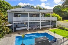  48 Rankin Drive Bangalow NSW 2479 $1,695,000 A quality built family home in a great family friendly neighbourhood, positioned just a few minutes walk from cafes and boutique shops, sporting fields and the primary school. This home offers stunning views across fields of green onto the lush rolling hills that surround Bangalow. On the upper level the residence comprises 2 good size bedrooms and family bathroom plus a multipurpose room which is the ideal space for a home office, 4th bedroom or kids playroom. At the rear, stairs lead to the split lower level featuring spacious open plan living, dining and a brand new kitchen with high ceilings. The master suite is also located on this level, offering an ensuite and built in robes and flows to the wrap around deck at the rear of the property. Entertaining family and friends is what this home is all about - with large windows and glass sliding doors creating a seamless flow of indoor and outdoor living. Sit back on the large, covered deck capturing cool summer breezes and warm winter sun overlooking your own resort style inground pool with a built in daybed, covered entertaining area and tropical gardens to the vistas beyond. Spectacular views, indoor and outdoor living set this home apart with plenty of privacy and only one neighbour giving a rural feel with all the convenience of village living. 