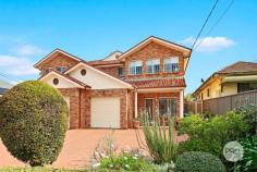  57 Ogilvy Street Peakhurst NSW 2210 Immaculately maintained with impressive proportions and sun-drenched interiors, this north-facing home is a great opportunity to enter into the highly sought-after Ogilvy Street address. Four overly large bedrooms, two with built-in-wardrobes and two with walk-in-wardrobes. The master bedroom also offers an ensuite, this property is larger than most and provides an abundance of space and storage. A modern open plan design which flows freely will impress even the pickiest buyers. The neat and tidy gas kitchen overlooks the manicured low-maintenance garden with outdoor cabana which is perfect for entertaining. Features Include: - Roomy floorplan with large entry foyer flowing to living and dining areas - Well-proportioned bedrooms, 2 with built-in-wardrobes and 2 with walk-ins - Master bedroom also offers a large ensuite bathroom - An immaculate main bathroom offering a bathtub & separate shower - Laundry with external access, additional toilet servicing ground level - Reverse-cycle multizone ducted air-conditioning - Gas water-heating, heating and kitchen - Back-to-grid Solar Panels - ADT Alarm Security System - Secure single lock up car garage with space for storage - Close proximity to Riverwood train station, shops and restaurants - Short walk to Peakhurst West Public School & Peakhurst shopping village 