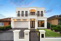  162 Dora Street Hurstville NSW 2220 Fusing contemporary design with timeless period features, this palatial residence re-defines modern living by showcasing impeccable style, high end finishes and grand proportions throughout. Opulently appointed at every turn, there is not an indulgent desire unmet across the property's two extravagant levels. French provincial influences blend seamlessly with state-of-the-art architecture to offer a captivating and surprisingly classic masterpiece that is sure to impress from the moment you enter. Set upon a generous level block and offering easy internal access from both the double garage and the elegant porch, prepare to be captivated by the grandeur of this superb property. Undeniably indulgent, whilst also exceptionally welcoming, this 6 bedroom, 5 bathroom home features multiple living spaces, a versatile floor plan and timeless appeal. The ground floor comprises two stylish living spaces, a superb and fully equipped gourmet kitchen, one of the 6 generous bedroom which is serviced by an adjoining bathroom making it ideal for guests, as well as the laundry. - Grand entrance with custom front door reveals a dual level floor plan bathed in natural light - Open plan living/dining starring a void ceiling, elegant chandelier and expansive windows - Designer Range kitchen featuring stunning curved island and walk in walk-in pantry - Five plush bedrooms, all with built-in wardrobes, four on the upper level, three with ensuites - Grand master suite flows outdoors to balcony, the perfect parent's retreat - Generous covered entertaining area with outdoor kitchen overlooks level lawn - Separate fully equipped out building, ideal for alfresco entertaining - Double garage with automatic statement door and internal access plus ample space for storage - Ducted air-conditioning throughout, security cameras and alarm - Within minutes of quality schools, shops, cafes, restaurants, recreational and transport facilities. 