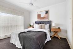  3 Hilltop Mews Frankston VIC 3199 $570,000 - $625,000 Superb space and lifestyle convenience await in this well presented freestanding villa showcasing an exciting opportunity for starters, families or downsizers to secure a low maintenance home in Lakewood Estate a short walk to Kingsley Park Primary School and Round About Cafe. Doused in wonderful natural light throughout, the residence delights with a spacious 6 metre living room flanked by bay windows and an interconnecting family room providing comfortable square footage for householders to spread out. An original kitchen with breakfast bar, gas cooktop and sleek white appliances is neat as a pin yet with scope for a contemporary update if desired, while the full family bathroom with shower, tub and separate toilet offers ensuite-style access off the master bedroom. Providing a peaceful and private alfresco space to relax outdoors, soak up the sun and entertain friends, the north-facing sundeck can be access via sliding glass doors off the family room in this well considered layout. Plush chocolate carpeting, ceiling fans, evaporative cooling, ducted heating, double garage and generous frontage are among the inclusions of this charming property on 327m2 (approx), which is located in a quiet pocket moments to Mt Erin College, the golf course, Frankston CBD, Monash University, the beach and Karingal Hub. 