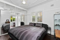  1/11 Eustace St Manly NSW 2095 Peacefully tucked away behind Manly Village just 150m from the beach at Manly Cove, this artfully updated Art Deco apartment shapes as a sensational lifestyle pad or prime investment opportunity. Interlacing elegant period detailing with stylish contemporary enhancements throughout a comfortably spacious layout, it rests in a boutique security building within a three minute stroll to Manly’s vibrant lifestyle hub, cosmopolitan eateries and the city ferry terminal. • Entrance foyer with rendered brick feature wall • High ceilings, dark stained timber floors, plantation shutters • Generous living and dining space with bay window seating • CaesarStone kitchen, gas cooktop and integrated dishwasher • Spacious bedrooms furnished with mirrored built-in wardrobes • The main adjoins a large sunroom – ideal for a home office • Chic bathroom with polished concrete-look tiled walls • Internal laundry, gas outlet, communal beach shower • Set within ‘Canberra’, an elegant security building of nine • Only six stairs up from the foyer or private level rear access • Stroll to shops/supermarkets, five minute wander to Manly Beach 
