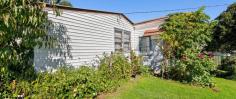  21 Bank St Cobargo NSW 2550 $399,000 "Laramie" - Quaint old style family home on a large 1214 m2 block of land in Cobargo. Homes in this low price range are getting harder to find as more are renovated or removed to build bigger modern homes. This home is in original condition, feels warm and inviting with a friendly vibe of visiting your grandparents many years ago. Features: Glassed in sun room at the entry, open plan lounge dining and kitchen all in one, two bedrooms, study area, large storage/craft room (aka "the pantry"), external laundry with shower and toilet. There is a new slow combustion wood heater which warms the home in winter as well as heating your hot water and allows you to cook on it also and open fire place that the current owners have closed off but easy to get it up and firing again. Outside: The 1214 m2 block of land has a gentle slope, good soil for gardening, two carports (one with a garden/tool shed), large shade trees, numerous cottage style gardens and an abundance of varied established fruit trees. Location: Short walk to Narira Creek (at the bottom of the street), swimming pool, main shopping area, Cobargo Hotel, sporting fields, showground and primary school. A twenty minute drive south takes you to Bega, or head east to Bermagui and its pristine beaches, amazing mountain views, boat ramps and many fine eating venues. Cobargo is a small town with a great friendly community. Markets are held each Saturday in the main street which attracts a lot of visitors and has the The Cobargo Folk Festival in May each year bringing performers together from all over the country. 