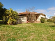  83 St Andrew Street Aberdeen NSW 2336 $512,500 Just the ticket for someone looking for space and opportunity. It's a BIG BIG Block with a tidy well cared for 2-3 Bedroom home that boast a 3-Bay Color Bond Garage shed, as well as Carports and a workshop/studio. Rich "honey comb" cypress natural floors set the interior decor alive, and you'll love the wood fire and old fashion fireplace and mantle. The Kitchen is finished well with a modern layout , overhead skylight and includes a Dishwasher, under bench oven and ceramic cook tops. There's a touch of yesteryear with a good old fashion combustion wood fire stove. The expanding enclosed aluminium annex gives lots of entertainment space and there's a separate laundry and toilet. Solar panels are fitted, and the house has a number of split system air conditioners and custom BIW's. There potential for just quiet enjoyment or even further sub-division of this great big 3,653 sqm lot. The house is rented and showing good returns. 