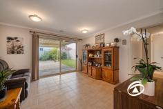  33 Oaklands Way Pakenham VIC 3810  $700,000 - $770,000 Timeless in style and beautifully presented this family home, neatly tucked away in a prime pocket of Lakeside is perfect for all buyers who have been searching for a trustworthy, forever home. Sitting on a large 694sqm corner allotment with immediate street appeal this versatile floorplan offers that can be configured to a multitude of requirements. The master suite offers a dressing room and ensuite featuring a double shower and corner spa. Two more bedrooms at the rear of the home feature built-in robes serviced by a family bathroom and a separate toilet. Further emphasizing its fine family credentials is a large front formal lounge, well-appointed kitchen with adjoining living/dining area, plus the added bonus of an additional rumpus/theatre room (optional 4th bedroom). Completing the picture is a huge covered outdoor entertaining area that overlooks the manicured rear lawn and border gardens Add a remote-control double garage with drive-thru access, additional side access for the boat/caravan, solar panels, water tank and two sheds. Close by to local shopping, schools, public transport and some of Pakenham’s best amenities, this one won't hang around for long. 