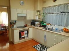  83 St Andrew Street Aberdeen NSW 2336 $512,500 Just the ticket for someone looking for space and opportunity. It's a BIG BIG Block with a tidy well cared for 2-3 Bedroom home that boast a 3-Bay Color Bond Garage shed, as well as Carports and a workshop/studio. Rich "honey comb" cypress natural floors set the interior decor alive, and you'll love the wood fire and old fashion fireplace and mantle. The Kitchen is finished well with a modern layout , overhead skylight and includes a Dishwasher, under bench oven and ceramic cook tops. There's a touch of yesteryear with a good old fashion combustion wood fire stove. The expanding enclosed aluminium annex gives lots of entertainment space and there's a separate laundry and toilet. Solar panels are fitted, and the house has a number of split system air conditioners and custom BIW's. There potential for just quiet enjoyment or even further sub-division of this great big 3,653 sqm lot. The house is rented and showing good returns. 