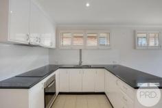  4 / 210 Chapel Street Glenorchy TAS 7010 $430,000 This fantastic unit would make a great first home, a place to retire or investment. Very well appointed with remote garage door to garage and internal access. Both bedrooms are a great size and have built in robes. The living area is open plan and opens to the secure rear yard. There are plantation blinds on some windows and electric shutters on others. Only moments away from shopping centres, public transport and schools, makes this a very appealing buy. • Great place to start or maybe retire • Sundrenched open plan living area • Secure and easy managed enclosed rear yard • Plantation shutters and electric shutters • Good size bedrooms with built-in-robes • Single garage with remote control and internal access • Spacious open plan living area opening to rear yard • Close to public transport, schools and shopping 