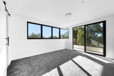  37 Yoorami Road Beverly Hills NSW 2209 Sophisticated in its design, exceptional in its uniqueness and playful in its functionality, this utterly striking and superbly crafted home represents flawlessness on a grand scale. With its clean, modern aesthetic and respectful, simple footprint, you can easily lose yourself in this sculptural work of art. Thanks to a basic, yet totally contemporary monochromatic palette and its state of the art appointments, this newly built 5 bedroom masterpiece expertly juxtaposes light, movement and texture to create a sense of allure and effortless appeal. In the main living space, soaring ceilings, unique architectural lines and bespoke design features, blend effortlessly to create light filled interiors as the day unfolds. Timber accents and statement pieces such as the curvaceous island bench in the kitchen, the somewhat elliptical niche carved in the ceiling above the designated dining area and the impressive yet unobtrusive staircase add warmth and a fundamental depth to the otherwise undefined interiors. The seamless indoor/outdoor flow invites you to savour time spent with family and friends as you retreat to the alfresco dining area and rear and fully fenced level yard. Upstairs, understated luxury is the order of the day with a master suite that features yet another sculptural piece - the wraparound balcony - as well as a generous walk-in robe and high-end his and hers ensuite. A further 3 bedrooms, 2 bathrooms and a spacious rumpus room complete the offering on this level. Exceptional in every way, this magnificent example of cutting edge architecture, offers a low maintenance lifestyle in a premium location. 