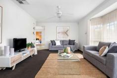  3 Hilltop Mews Frankston VIC 3199 $570,000 - $625,000 Superb space and lifestyle convenience await in this well presented freestanding villa showcasing an exciting opportunity for starters, families or downsizers to secure a low maintenance home in Lakewood Estate a short walk to Kingsley Park Primary School and Round About Cafe. Doused in wonderful natural light throughout, the residence delights with a spacious 6 metre living room flanked by bay windows and an interconnecting family room providing comfortable square footage for householders to spread out. An original kitchen with breakfast bar, gas cooktop and sleek white appliances is neat as a pin yet with scope for a contemporary update if desired, while the full family bathroom with shower, tub and separate toilet offers ensuite-style access off the master bedroom. Providing a peaceful and private alfresco space to relax outdoors, soak up the sun and entertain friends, the north-facing sundeck can be access via sliding glass doors off the family room in this well considered layout. Plush chocolate carpeting, ceiling fans, evaporative cooling, ducted heating, double garage and generous frontage are among the inclusions of this charming property on 327m2 (approx), which is located in a quiet pocket moments to Mt Erin College, the golf course, Frankston CBD, Monash University, the beach and Karingal Hub. 