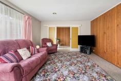  6 Coora Court Frankston VIC 3199 $620,000 - $682,000 Take the first step onto the property ladder or kickstart your renovation aspirations with this well-situated classic 1970s home tucked at the end of a tiny court in paces to McClelland College, Ballam Park Primary School and spectacular Ballam Park. Beyond the flamboyant decor of the era, a creative eye will instantly spot the potential for a stylish modern refurbishment of this family-friendly layout, which boasts two large living areas and a dining zone. Fitted with timber-veneer cabinetry and slate-look vinyl flooring, the kitchen enjoys a free-flowing layout spilling out to the family room and dining zone and is perfectly functional with a dishwasher, oven and gas cooktop as it awaits an eventual update. The three bedrooms cradled down the hallway share a full family bathroom with shower, bathtub and separate toilet, while a semi-enclosed covered patio area is waiting to be transform into an alfresco oasis. Just 900 metres to Karingal Village Shopping Centre, 650 metres to Ballam Park and 1.3 kilometres to the major shopping, restaurants and cinemas of Karingal Hub, the home also features ducted heating throughout, under house storage, a double garage and sits on a 613m2 (approx) allotment with potential for subdivision or redevelopment (STCA). 
