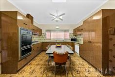  609 Barkly St West Footscray VIC 3012 $1,170,000 Step back in time and enjoy this four bedroom, solid brick house in all of its original glory. With the quirks of 70’s style and the space of a generous family home, there is a lot to love and endless possibilities to make this home your own. The home’s bedrooms are spacious with built-in robes, a large home office can be converted in to a fourth bedroom. The bedrooms are serviced by traditional 70’s bathroom with pastel blue tub, wall to ceiling feature tiles, vanity with storage, shaving cabinets, large linen cupboard, shower and separate toilet. Take your pick of two generous lounge spaces. The formal living area features a decorative ceiling and loads of 70’s charm, the second space opens to the home’s sunroom, making indoor/outdoor living effortless. Entertain in the light-filled, formal dining room with the same decorative ceilings and 70’s charm. The home’s kitchen is generous and features an abundance of storage along with, 900 gas cooktop, triple sink, retro feature tiles and plenty of bench space. There is ample space for a casual dining area in this room. The home is completed by a walk-through toilet and laundry with sink, ample storage and access to the sunroom. The property also features established front and rear gardens, veggie patch, shed, external kitchen and double garage. Located approximately 10kms from Melbourne’s CBD, an abundance of amenities are available at your doorstep. Barkly Street shops, restaurants and cafes, Whitten Oval, Central West Shopping Centre, Western Hospital, Footscray Market, West Footscray Train Station, schools, parklands and bus stops are just around the corner. Additional features: – 526.55m2 of land – Rear access via laneway – Security shutters throughout – Grand entry 