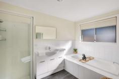  2/10 Badden Court Glenorchy TAS 7010 $595,000 Start, invest or empty-nest, and idle the days away within this unbeatable restful location! Set within a boutique few with no strata and situated for sun-bathed kunanyi views, this 3-bedroom home captures a soothing essence over two generous levels, providing the opportunity to live or invest with endless all-day sun and a tightly-held address. Styled with neutral tones and polished up with laminate floorboards and plush carpets, this sun-filled home sparkles with well-defined lounge and dining areas on the first floor and generous bedrooms, including two with robes. Orientated to entertain within the open meals and alfresco deck, the well-appointed kitchen boasts ample bench space and storage, a dishwasher and an electric stove, whilst a reverse-cycle heat pump creates a comfortable atmosphere year-round. With a full-width storage room, a huge laundry, external shutters, a bright family bathroom with a deep bath and easy parking for two, including a single garage, it's an idyllic low-maintenance getaway with all the modern perks! Secure, stylish and stretched out in the sun, there's nothing to do here but enjoy the generous backyard and fabulous location, just a short drive from Northgate Shopping Centre, cafes, restaurants, buses and the spoils of the riverfront. 