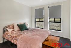 32 Jubata Drive Tamworth NSW 2340 $749,000 Located in the sort after Moore Creek Gardens Estate, amongst beautiful new and established quality built homes, this four bedroom home has been designed for all seasons and designed to connect with the outdoors. As you enter the family home the warmth and appeal that has been created is evident in every corner. The theatre room as you enter is inviting, perfect for some quiet time or to enjoy a movie OR 4th bedroom. The long, wide hallways takes you through to the open plan kitchen, dining and family are all spacious light and family friendly. The kitchen is stunning, a gorgeous charcoal, black and grey colour palette with beautiful stone tops. Very practical and includes fabulous preparation and bench space , gas cooktop and plenty of storage and space with a butlers kitchen that you will love. The expansive master bedroom includes walk in robe and en-suite. The other three bedroom are all good sizes with built in robes and the main bathroom is light and functional with touches of colour and texture all in statement grey tones that won't date. The double garage includes remote access and internal access to the home via the laundry and butlers kitchen. If entertaining is your thing then you will love to escape to this backyard. Covered for year round enjoyment, plenty of space for lounging and dining. Create a BBQ and fire pit area for those cosy winter camp fires, add a swimming pool and large shed and you have got your lifestyle sorted. Power is in the ground for the shed to be erected PLUS no neighbours at the back, just hills and a rural setting. The large yard is 2047m2 and with some trees, turf and landscaping 32 Jubata Drive will be your paradise to call home. Put you own stamp on the design. The build was completed in 2022, has ducted reverse cycle zoned air conditioning and is only minutes to town, close to Calrossy and McCarthy Catholic College, Supermarket and so much more. 