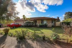  22 Catherine Street Castletown WA 6450 $425,000 Renovated to reveal a spacious family home featuring formal lounge with reverse cycle air-conditioner, open kitchen and dining with bi-fold doors opening to a sunken, sun-lit games room. Kitchen has a country feel with white cupboards, timber bench tops and a walk-in pantry, with adjacent laundry. There are 4 spacious bedrooms, 2 study nooks, a stylish master bedroom with ensuite and walk-in-robe and a central main bathroom/semi ensuite. The large shed can be used as a workshop or outdoor games room. Features 2 garden shed, retic to front garden, 2 water tanks (one feeds kitchen) and double garage under the main roof. 