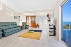  50 Kalang Road Kiama Heights NSW 2533 $1,995,000 - $2,100,000 Perched up high with breathtaking views over 'Loves Bay' and rural rolling hills lies this well maintained and modernised family home. Solidly built and having had just the one owner, this property enjoys plenty of natural light and an outlook most people dream of. Idyllically located in the Kiama Heights enclave this home is situated between the pristine 'Easts' beach & 'Loves' bay, coastal walking tracks and headland reserve, offering the coastal lifestyle change you have been dreaming of. This substantial home comprises of 5 bedrooms, master with ensuite and walk-in robe, 3 bathrooms, 2 separate living areas, impressive modern quality kitchen, drive-thru garage and large entertainment deck flowing effortlessly from the main upstairs living area. Additional features include fantastic storage, room in the garage for a workshop, above ground pool, 6.6kw solar panel, 2 x water tanks, split system a/c and potential to create self-contained flat with downstairs bedroom. Situated on an expansive 797sqm block with established gardens and surrounds, there is a feeling of space and plenty of room to grow your own vegetables or yard for the kids to run around. With this home already modernised throughout and a spacious entertainment deck off the main living room taking full advantage of the stunning coastal line, there will be plenty of time to entertain friends/family or sit back and enjoy vista. 