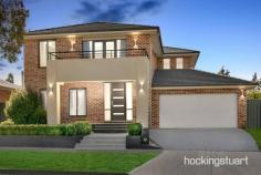  13 Warruga Cres Wollert VIC 3750 Ideally located within the highly sought-after Eucalypt Estate, this proud 52sq architecturally designed beloved family home set on a generous 626m² (approx), with easy access to Craigieburn road & reputable schools and gorgeous parklands is now ready for its next family to enjoy. Immaculately presented throughout, it comprises 5 spacious bedrooms each with a walk in robe and ensuite. Laid out with separate living zones for entertaining a large family, home office and study room. Use the large room for a cinema or a formal lounge. The kitchen is large with cabinetry and stone benches, butlers pantry and quality appliances, adjacent meals and family area. The retreat upstairs is a perfect space for children and teenagers to relax in their own space. Journey outside to a tiled alfresco perfect for all-year round entertaining, plus you can't forget the spacious backyard for those outdoor summer parties! Loaded with features which include: - 5 Bedrooms - 5 Bathrooms - 5 Walk in Robes - Park facing Entrance - Park Views - Ducted Heating - Dishwasher - Stone in kitchen and bathroom. - Two car garage with drive through and internal access - Fully landscaped front and backyard. - Quality floorboards - Quality window furnishing This home ticks all the boxes with no expense spared. Come see for yourself and find out why this is so much more than just a location. 