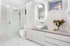  13 Noorinan Street Kiama NSW 2533 $1,750,000 - $1,850,000 Impeccably maintained throughout, this unique and substantial home offers multiple entertaining areas enjoying panoramic township and ocean views, all located in the highly prized central Kiama locale. Step out from the master bedroom onto the balcony and take in the morning coastal views or beautiful afternoon sunsets over the escarpment, or head up to your private courtyard and enjoy your terraced gardens and ocean views. This unique home has plenty of space with options and is sure to impress. The home features 4 bedrooms in total, master with updated bathroom and spacious walk-in robe, light filled open-plan living flowing into a large kitchen with butler's pantry, multiple entertainment balconies and courtyard, freshly polished timber flooring, new carpet throughout, 2 generous bathrooms with extra powder room, ducted air-conditioning, substantial double garage with remote access and stunning terraced gardens surrounding the home. Positioned on the high side of Noorinan Street, this contemporary coastal haven truly is one of a kind. Located within walking distance less than 1km from Kiama's pristine 'Surf' beach, train station, shops, and cafés, you will certainly enjoy the Kiama lifestyle on offer. 