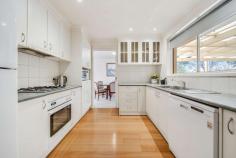  9 Merrett Gardens Gordon ACT 2906 This property will be going to auction on Saturday, 10th September as apart of our Spring Selection Event. All auctions will be held in the Ray White Canberra Auction Room - 2/14 Wales Street, Belconnen. Please note exact auction times will be released closer to the event. Lovingly renovated and extended over a single level, with clever consideration for the modern lifestyle this four bedroom home with formal and informal living rooms, together with a large rumpus is one for the growing or established family. From the leafy street frontage, the charm of the 885sqm block begins. Established gardens surround and shade the home, making entertaining a delight in the spacious covered outdoor area. At the entry to the home, your interest is instantly drawn to a light and bright north facing living room and vast open space as the inside and outside become one through large framed windows. The earthly kitchen is the centrepiece of the home and is complimented by Tasmanian Oak floorboards which flow seamlessly throughout. Incorporating an electric oven and gas cooktop the kitchen includes an abundance of storage, built-in pantry, bench space and display cabinets. Each of the bedrooms are generous in size and most include built-in wardrobes. The segregated master bedroom is at the front of the home and is complete with a private ensuite and built-in robes. The household washing can be sorted from within the separate laundry and can be accessed from the external entry. Additional storage space is provided by the linen closet and cloak cupboard. The large covered outdoor entertaining area doubles as an ideal location to bask in the morning sun or a protected place to bring all your family and friends together for a BBQ while the children and pets explore the expansive manicured garden. A double garage with remote access ensures the covered transfer in all weather conditions and an additional open-air parking space ensures plenty of off-street parking. Adjacent to parklands and ponds, walking and riding trails and close to public transportation, schools and shops; the home is certain to not last long.  Additional features Include; Overlooking parklands and ponds Ducted gas heating and evaporative cooling Gas cooktop, electric oven, dishwasher Formal lounge, dining, family and rumpus/multipurpose room Master bedroom with ensuite and robes Exceptionally large fourth bedroom Built-in wardrobes for three Large covered outdoor entertaining area Double garage with remote access Single and double glazed windows Rates $3,551.14pa, Land tax $5,824.40pa (if rented) Living 202sqm, Block 885sqm 