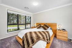  9 Carrera Cres Cooranbong NSW 2265 $880,000 to $920,000 Set against a gorgeous backdrop of bushland sits this ultra-modern, single-level executive family home on a generous 504sqm parcel. Offering spacious proportions and immaculate styling, this residence exudes space, privacy and the kind of luxurious finishes that will attract the fussiest of buyers. Boasting four generous bedrooms with living and relaxing zones in equal measure, its open floorplan invites you to float seamlessly from inside to the Grande sheltered alfresco with impressive built in BBQ and fridge, level lawns and peaceful bush vistas. Prepare sumptuous chef inspired meals in the ultra-modern kitchen, with s/s appliances, sleek island design, Stone surfaces and waterfall edges, or enjoy a theatre-at-home experience in the dedicated media room. Retreat to your own privately set master, complete with WIR and full-sized en-suite. With plenty of room for growing families, this home is close to the best schools in the area and a short drive to Morisset’s shopping precinct. – Situated in sought after peaceful green enclave and surrounded by other quality residences – All finishes have been chosen with a designers eye, with only the best of inclusions – The privately set master includes double WIR and up-to-the-minute stylish full en-suite – Family bathroom with freestanding bath and stone top vanity – Ducted air conditioning, internal laundry, double garage with internal access, level block, security cameras, crim safe doors – Minutes to Avondale School, Avondale College and local village shops – Short drive to Morisset town centre with all amenities and freeway entry. 