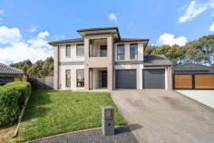  9 Sax Place Macgregor ACT 2615 This property will be going to auction on Saturday, 10th September as apart of our Spring Selection Event. All auctions will be held in the Ray White Canberra Auction Room - 2/14 Wales Street, Belconnen. Please note exact auction times will be released closer to the event. With its effortless contemporary style, relaxed large family footprint and charmed entertaining spaces, this exceptional home is sure to please. Quietly positioned at the end of the cul-de-sac in an exclusive street, the home has been designed to create a superb sanctuary for life. The fluid floor plan welcomes a spacious formal lounge and dining, together with a vast family room and adjoining theatre at the ground floor. On the top floor, the bedrooms open onto an expansive rumpus where the versatile space provides further play room, an office with a view or further lounging. The centrepiece is the family kitchen and large living and dining room that sweep out to the impressive alfresco entertaining with an outdoor kitchen. Stone bench tops, a walk-in pantry and gas and electric cooking appliances round out the abundant kitchen. A master bedroom with a generous dressing room and glam station amplifies the luxury and elegance of this home. The bathrooms are adorned with floor-to-ceiling tiles, quality tap ware and a spa bath worthy of a late night soak or a kids bubble bath. This superb home is ideal for families, professionals or downsizers alike to enjoy a prime lifestyle setting. Galley entry with exceptional street appeal Four bedrooms with built-in robes Master bedroom with dressing room, custom cabinetry and Juliette balcony Main bathroom with spa bath Guest powder room with shower Floating timber flooring and neutral colour theme Formal lounge, theatre, family room, rumpus Double garage with internal remote access Ducted reverse cycle heating and cooling Gas cooktop & electric oven Continous gas hot water Alfresco entertaining with outdoor kitchen Walk-in linen closet Rates $3,562.41pa, Land Tax $5,846 (if rented) Ground Floor: 171sqm, Upper Floor: 158sqm, Total Living 329sqm, Garage: 41sqm 