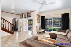  36 Barnes Street Earlville QLD 4870 $1,500,000 Situated at the top of Barnes Street, 3 metres above street level is this stunning two-storey, solid block home on a generous, flat 1056m2 block. This is an executive home with lots of space with 3 bed 2 bath (with spa bath), sunroom, upstairs sitting room leading out onto a large, aluminium deck looking over the spectacular views of Cairns. Downstairs is large entry leading to a sunken lounge and living room, internal laundry, second bathroom, storage room, 2 car garage and large rear patio. Outside you have flat grassed area with well established gardens and paved area. To the rear of the property there is a beautiful, sparkling in-ground pool with a whopping 50,000 litre capacity and a picturesque rock waterfall. Again the views from are just stunning. There is a 200m2 flat sports area just perfect for the kids and pets to play safely and securely. Features: • 4.5kw solar with German invertor • City views and mountain views 360 views • Built-in-robes in bedrooms with full length mirrors • Tiled downstairs • Security screens all windows and doors • 50,00 litre pool with rock waterfall • Large, paved driveway • Landscaped gardens with Buddha feature • Generous sized 1056m2 block including 200m2 flat sports area • Large aluminium deck looking over Cairns 