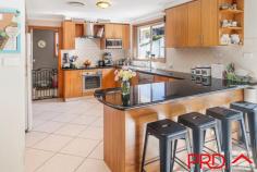  32 Daruka Road Tamworth NSW 2340 $720,000 This expansive family home is situated near the TAFE, Oxley High School, Tamworth Public School and only 3 minutes to town. If spacious living is what your growing family is screaming out for then you need to inspect this amazing home. Built back off the road, with established trees and gardens, plenty of car parking for 4 cars and a grand entrance. Downstairs offers a spacious entrance, double remote garage, study and the 5th bedroom. The timber staircase is inviting and leads you up to the large spacious living area that take full advantage of the stunning panoramic views of the city and hills. The upstairs balcony will be the perfect spot to take in the morning with a coffee, or to enjoy at the end of a busy day with a glass of wine. The dining, kitchen and family room are open, the kitchen includes electric oven and cooktop, dishwasher and enjoys a lovely outlook out to the paved outdoor area and reserve at the back of the large backyard. The paved backyard is the perfect space if you like to entertain and the back yard is a blank canvas for you to add your touch or to just leave as is. The master bedroom is enormous and includes ample storage and en-suite. The other bedrooms are queen size and include built in cupboards. Ducted air con, intercom, ceiling fans and solar panels. 