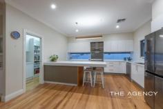  7 Surrey Road Rivervale WA 6103 $1,000,000 Situated in a cul-de-sac in the high-end precinct of Rivervale, this four-bedroom, two-bathroom home is one of a kind. Occupying a 683sqm block, this character home offers everything a family or professionals could possibly desire, and as it's move-in ready, this is an investor's dream. Completely renovated throughout, this weatherboard property features stunning Blackbutt floorboards, leadlight windows, high ceilings and a wide hallway drawing your eye to gorgeous open plan living. The gourmet kitchen will inspire even the most reluctant cooks, especially when alfresco entertaining on the generous North-West facing deck. The remote-controlled white picket fence and front porch completes the pretty picture. Features at a glance: • Gourmet kitchen with engineered stone countertops, bench seating, dual sinks, free-standing 5-burner gas cooktop & 900mm oven, picture window, Bosch dishwasher, microwave recess, pendant lighting and huge amounts of storage • Walk-in Butlers Pantry with countertop and room for extra fridge • Spacious open plan living with built-in cabinetry and pendant lighting • Master bedroom includes an ensuite with dual vanities, large walk-in robe and French doors to the deck • One bedroom features an exposed brick chimney and could function as a formal lounge/home office • Main bathroom with exposed brick chimney, bathtub and a separate toilet • Both bathrooms feature floor-to-ceiling tiles, frameless shower screens and floating vanities with engineered stone countertops • Decked alfresco dining under the main roof with downlights, a fan, café blinds and a serving bench to the kitchen • Carpet and ceiling fans in the bedrooms • Separate laundry with loads of storage and external access • Ducted Reverse Cycle air-conditioning • 6.65kV Solar Panels with 5kV Inverter • Security screens & LED downlights • NBN wired direct to House with fully built-in wired Network cabling to each bedroom • Double carport and plenty of additional parking • Powered and plumbed workshop with a 3rd toilet and room for a car/trailer including electric roller door • Easy-care and fully-enclosed gardens behind a remote-control white picket fence • Fully renovated character weatherboard home 