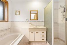  7 Chunar Grove McCrae VIC 3938 $900,000 - $990,000 On a generous 803sqm (approx.) parcel of land, this cherished and well-maintained 3-bedroom home would be a lovely permanent home or holiday retreat close to the beach. Cosy, comfortable and completely liveable as is, it's perfect if you are looking for a modernisation project to live in while you renovate, plus with glimpses of the water from the front, you could add a 2nd storey (subject to council approval) to provide beautiful bay vistas. All just moments to McCrae/Rosebud amenities and stunning beaches. - Spacious L-shaped lounge with wood heater set within a brick fireplace, plus large dining area - Farmhouse-style kitchen with abundant storage, copper rangehood, double sink with garden view - Master bedroom with ensuite and WIR, plus 2 bedrooms with BIRs - Central bathroom with bath and separate shower - Laundry with storage and garden access to large partially-undercover patio and built-in BBQ - Split system reverse cycle air-conditioning unit in lounge & new gas heater to dining - Private, fully-fenced back garden with multiple fruit trees and ample lawn space - Large circular driveway around attractive easy-care gardens and a double garage - Close to freeway access and all the delights of Mornington Peninsula 