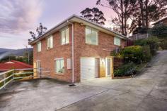  2/10 Badden Court Glenorchy TAS 7010 $595,000 Start, invest or empty-nest, and idle the days away within this unbeatable restful location! Set within a boutique few with no strata and situated for sun-bathed kunanyi views, this 3-bedroom home captures a soothing essence over two generous levels, providing the opportunity to live or invest with endless all-day sun and a tightly-held address. Styled with neutral tones and polished up with laminate floorboards and plush carpets, this sun-filled home sparkles with well-defined lounge and dining areas on the first floor and generous bedrooms, including two with robes. Orientated to entertain within the open meals and alfresco deck, the well-appointed kitchen boasts ample bench space and storage, a dishwasher and an electric stove, whilst a reverse-cycle heat pump creates a comfortable atmosphere year-round. With a full-width storage room, a huge laundry, external shutters, a bright family bathroom with a deep bath and easy parking for two, including a single garage, it's an idyllic low-maintenance getaway with all the modern perks! Secure, stylish and stretched out in the sun, there's nothing to do here but enjoy the generous backyard and fabulous location, just a short drive from Northgate Shopping Centre, cafes, restaurants, buses and the spoils of the riverfront. 