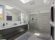  12 Annas Place Warwick Qld 4370 $980,000 This stunning Coastal Hamptons home was built in 2020 by Todd Jeffries. It is absolutely immaculate in condition and the attention to detail everywhere you look is so impressive. Sitting on a comfortable 1136 sqm allotment in an elevated position at the end of a quiet cul-de-sac. This property is nice and handy to town and many other facilities. It is in a great neighbourhood surrounded by other new, quality homes. The features here are far too numerous to mention however let me highlight a few: Beautiful, wide entry with built in bookshelves Four generous built in bedrooms with ceiling fans Stunning ensuite - twin basins, stone top, large shower & skylight Excellent walk in robe with his and hers areas - loads of storage Expansive, bright & airy open plan living area with raked ceilings Electric blinds to indoor & outdoor living areas + plantation shutters Built in bar, tv unit/storage & study nook Stunning kitchen with soft close drawers, feature lights & stone benches Miele dishwasher & electric appliances Generous walk in pantry with solar skylight Reverse cycle ducted air-conditioning Powder room/3rd toilet Lovely main bathroom with bath & shower niches Heated inground magnesium pool with fountain Lovely fire pit area + pool deck Tiled outdoor area (private) with built in bbq Generous laundry with 2 x built in hampers 8 kw solar Established, low maintenance gardens with edging Oversized double garage with epoxy floor + built ins x 2 Rainwater tank (plumbed to all toilets) Front deck Exposed aggregate driveways 9 x 3.5 m lined shed with power & remote door Skillion for caravan/motorhome I cannot stress to you how well this home and its surroundings have been finished. Nothing but the best quality has been used from start to finish. It's not often you have the opportunity to purchase such a modern home of this quality that literally has everything you could possibly want so be super quick to secure! 